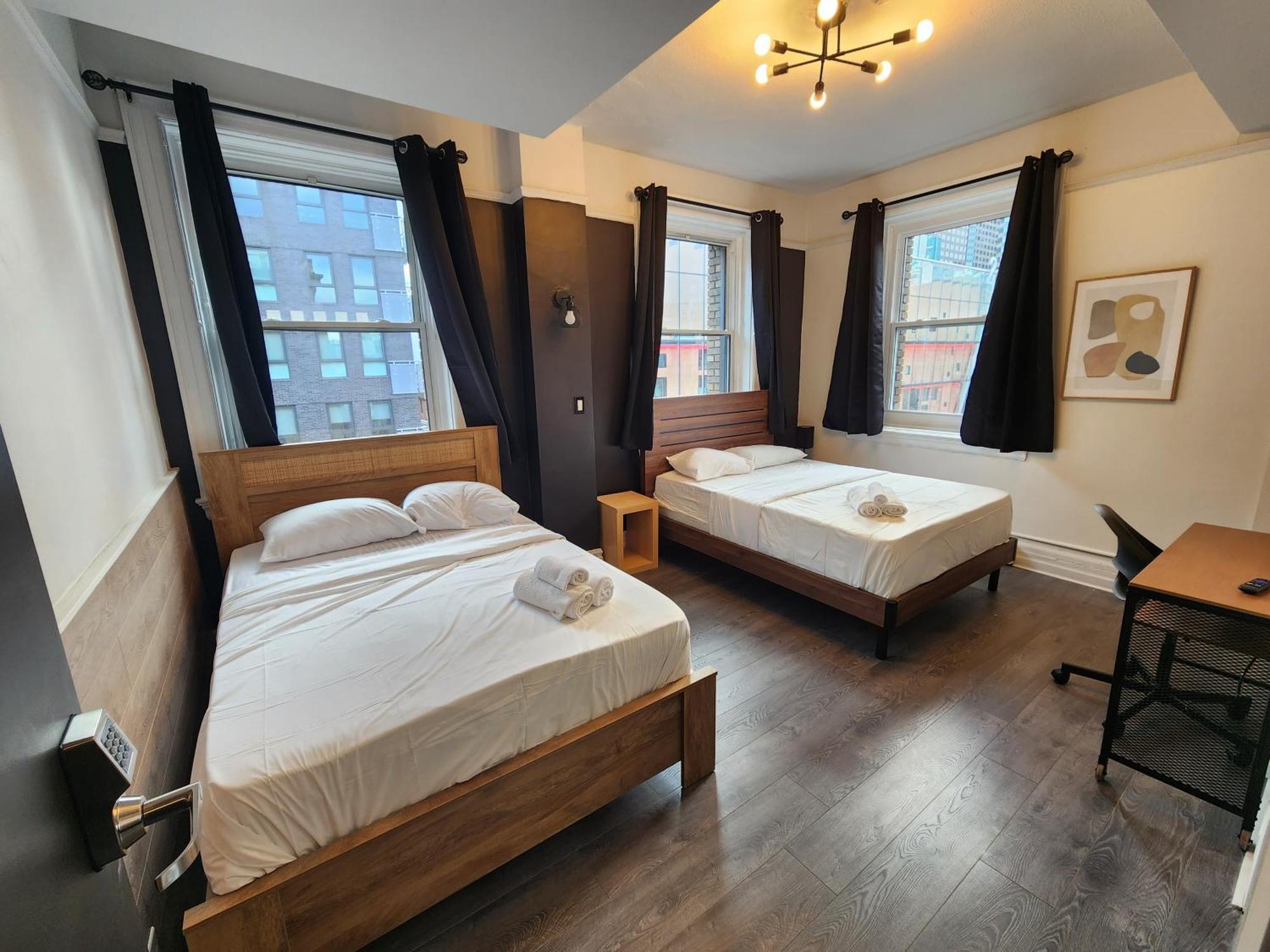 Le Sand & Stone Hotel Montreal Phòng bức ảnh
